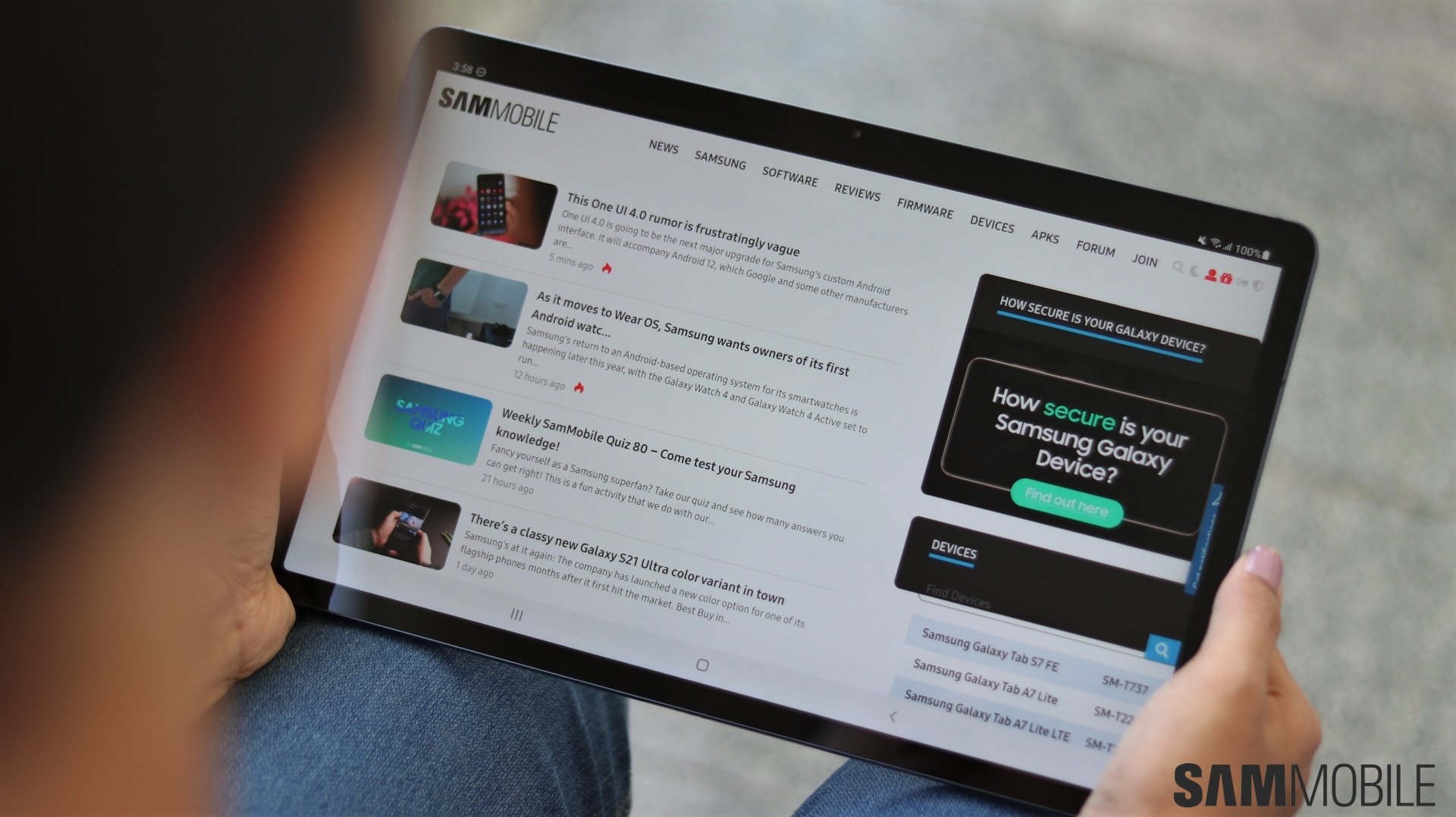 woman holding samsung galaxy tab s7 fe